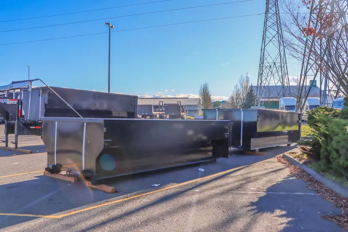 Roll-off dumpster ready for waste disposal at job site for Roll Off Dumpster Rental in Littleton